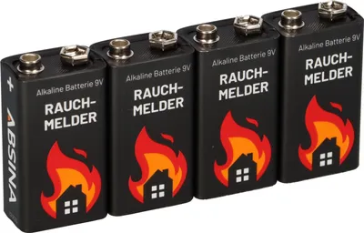 Four 9V alkaline batteries for smoke detectors are lined up against a white background.
