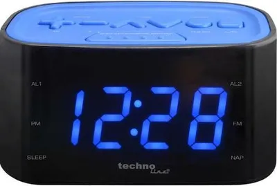 A digital alarm clock displaying the time.