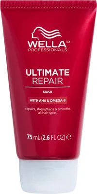 A product shot of a red tube of Wella Professionals Ultimate Repair Mask.