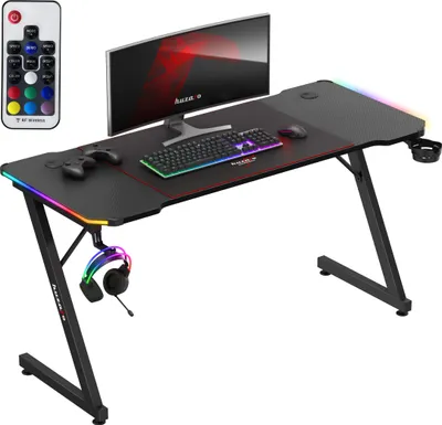 Produktbild von huzaro Hero 3.3 RGB | LED Gaming PC Tisch Schreibtisch | Inklusive Mauspad | Kopfhörerhaken Getränkehalter | Kabelorganisator | 140x60cm | Schwarz