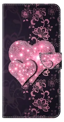 A close-up of a phone case with a floral pattern and two pink hearts.