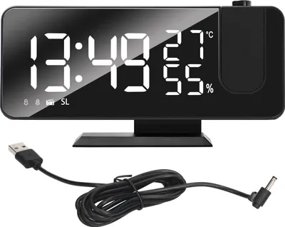 A digital projection alarm clock with a USB cable.
