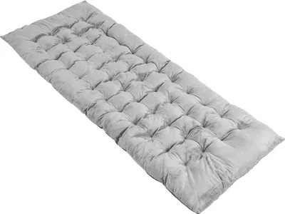 A gray tufted mattress or cushion, likely for a lounge chair or sun lounger, is shown against a white background.