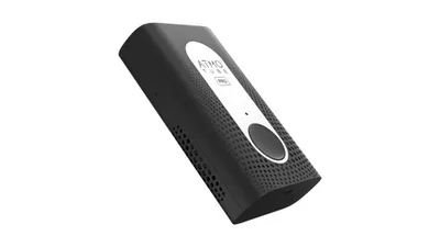 A black ATMOTUME PRO air quality meter is shown against a white background.