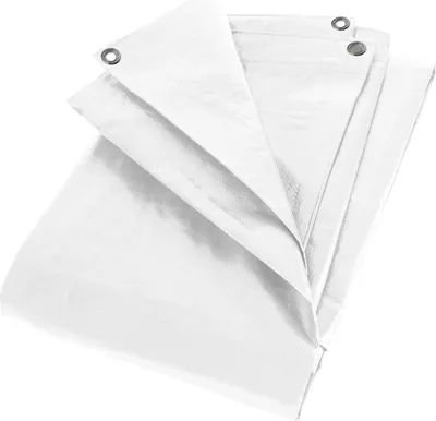 A white tarp is folded and layered on a white background.