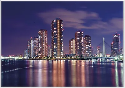 Produktbild von Wallario Wandbild Tokyo- Skyline bei Nacht, Größe: 70,30 x 100,30 cm, Poster mit weißem Kunststoffrahmen