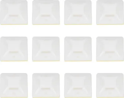 A grid of white cable tie mounts on a white background.