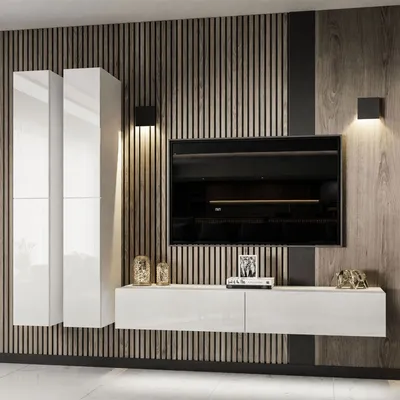 A modern living room wall unit with a TV, cabinets, and a media console.