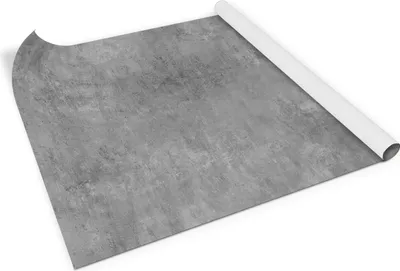 A roll of self-adhesive furniture film with a concrete texture is shown on a white background.