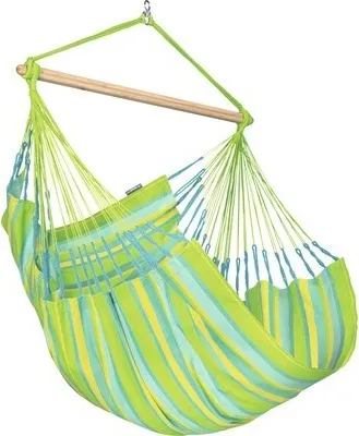 A striped hammock chair hanging from a wooden bar.