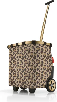 A leopard print shopping trolley with a gold handle and wheels, isolated on a white background.