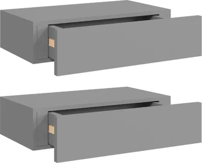 Two identical grey wall-mounted drawers are shown side-by-side against a white background. The drawers are slightly open, revealing a small wooden piece inside.