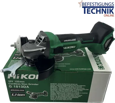 A cordless disc grinder is displayed on its packaging box.
