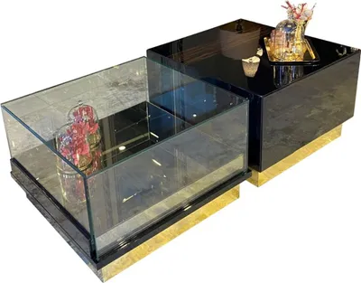 Produktbild von Casa Padrino Luxus Art Deco Couchtisch Dunkelbraun / Schwarz / Gold 135 x 80 x H. 40 cm - Edler Wohnzimmertisch - Art Deco Möbel