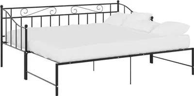 A black metal daybed with a white mattress and two white pillows.
