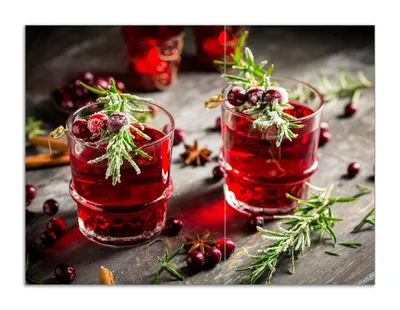 Produktbild von Wallario Herdabdeckplatte aus Glas, Größe 70 x 52 cm 2-teilig, Motiv Winterlicher Cranberry-Punsch mit Rosmarin