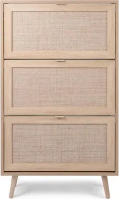 A wooden shoe cabinet with three doors, each featuring a woven cane panel.
