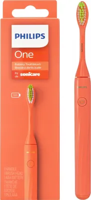 A Philips Sonicare One electric toothbrush and its packaging are displayed.