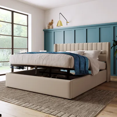 A bedroom with a bed, large window, and wall paneling.