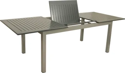 A gray aluminum outdoor dining table with an extendable leaf in the center.