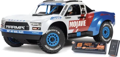 A remote-controlled off-road truck with batteries.