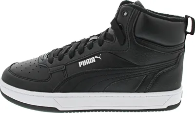 A side view of a black Puma sneaker with a white sole.
