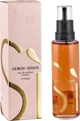 A product shot of a perfume bottle and its packaging.
