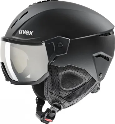 A black ski helmet with a visor, shown from a three-quarter angle against a white background.