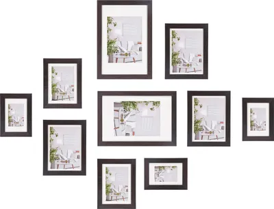 A collection of empty picture frames arranged in a gallery wall style on a white background.