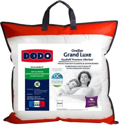 A pillow in its packaging, with a woman and child depicted on the packaging.