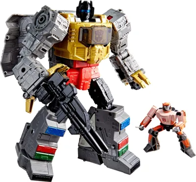 Two Transformers action figures, a large gray and gold robot and a smaller orange robot, are posed against a white background.