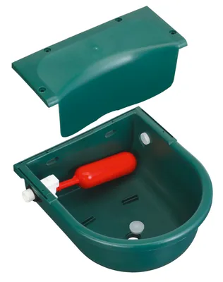 A green plastic water trough with a red float valve, shown with its lid removed.