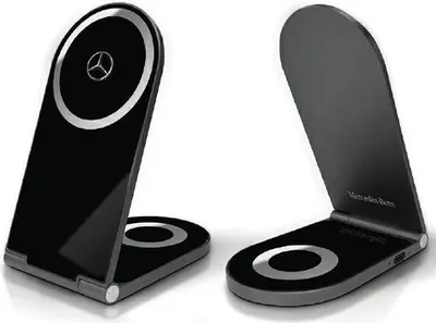 Two black foldable wireless chargers with silver accents and the Mercedes-Benz logo are shown against a white background.