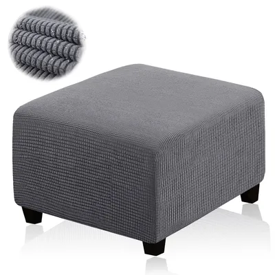 A grey ottoman cover on a white background.