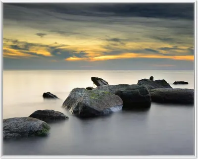 Produktbild von Wallario Wandbild Mystische Felsen im Meer, Größe: 40,30 x 50,30 cm, Poster mit weißem Aluminiumrahmen