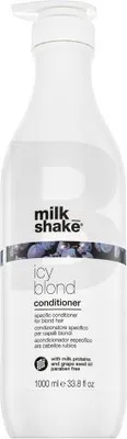A white bottle of Milk_Shake Icy Blond Conditioner with text and a band of blue berries.
