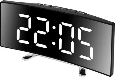 A digital alarm clock with a curved mirror display showing the time.