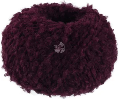 A ball of burgundy yarn with a textured, fluffy appearance.