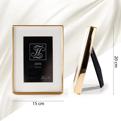 Zdjęcie produktu dla Fink KIM, rama na zdjęcia 10x15 cm, szkło, metal, gładka, złota, szerokość: 22 cm, wysokość: 17 cm, głębokość: 4 cm, numer produktu: 133025
