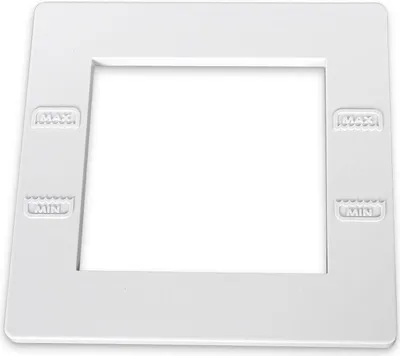 A white plastic frame with embossed markings.