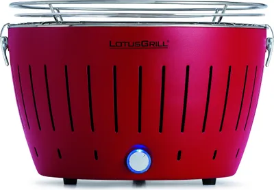 A red LotusGrill Classic portable charcoal grill is shown from the front.