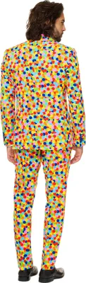 A man wearing a colorful confetti-patterned suit, viewed from the back.