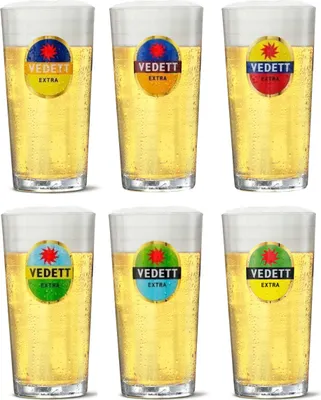 A collage of six glasses of Vedett Extra beer, each with a different colored label.