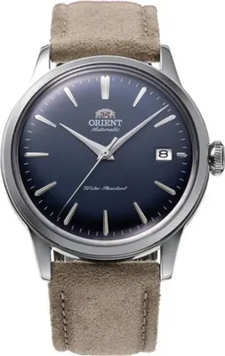 A close-up studio shot of an Orient watch with a blue dial and a brown strap.