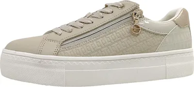 A single beige sneaker with a platform sole and a side zipper.