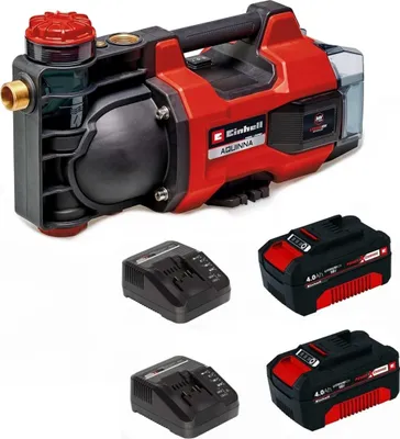 A red and black water pump with two batteries and two chargers.