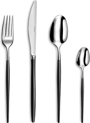 A set of four stainless steel cutlery pieces with black handles, arranged in a line against a white background.