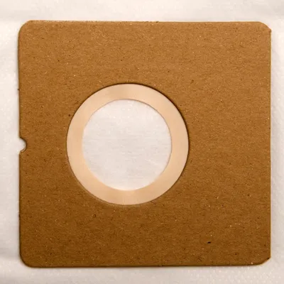 A close-up view of a vacuum cleaner bag filter.