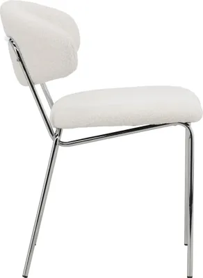 Side view of a white boucle chair with chrome legs.