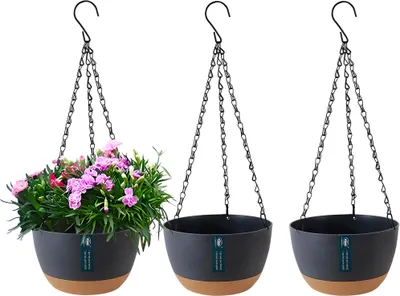 Three hanging planters are displayed against a white background. One planter contains pink flowers, while the other two are empty.